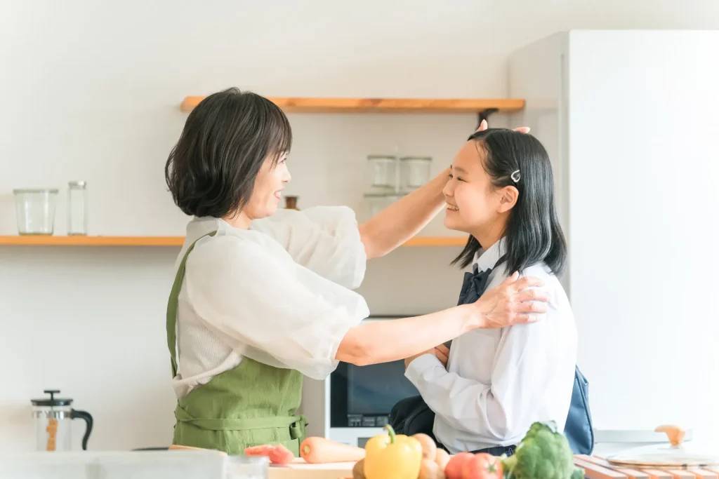 信頼しあっている親子の画像
